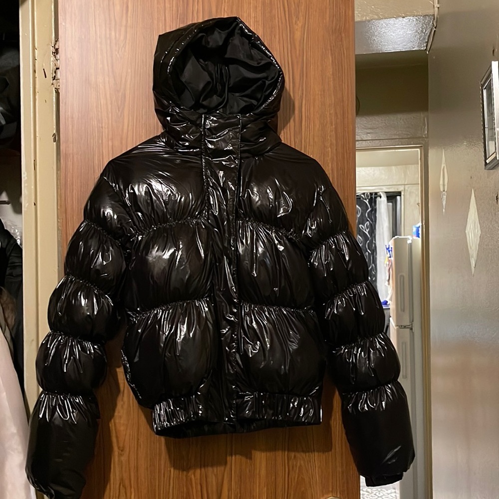 this is a all black bubble jacket ,brand new never really worn .